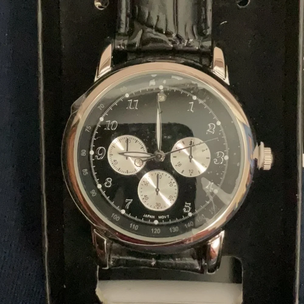 Avon Black face Chronograph Quartz Watch new in box. Needs batteries